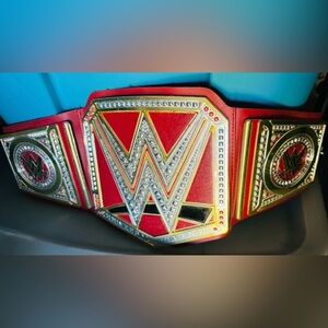 Collectibles WWE figure and belts